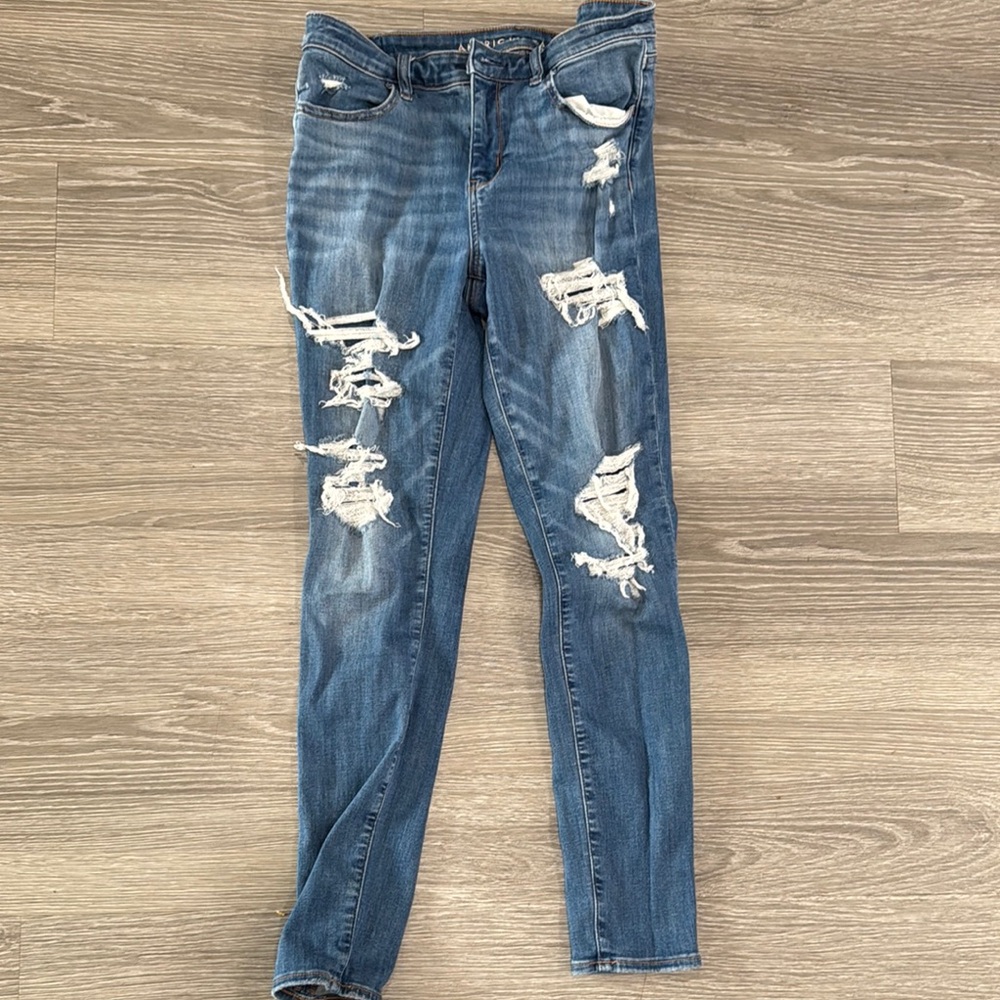American Eagle Blue Jeggings with Distressed Design